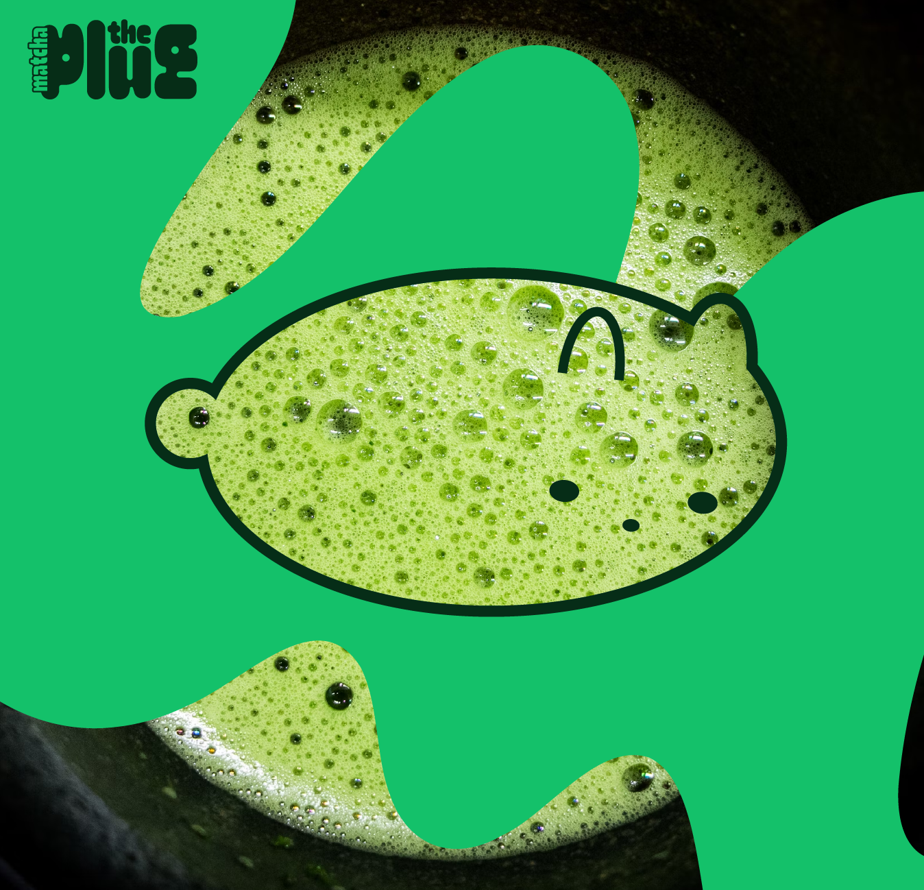 Matcha drink with white cat and decorative elements